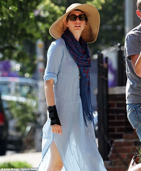 Anne Hathaway Wears Sheer Blue Dress and White .